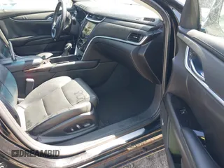 2014 Cadillac XTS with VIN 2G61L5S38E9202763, listed as a IAAI auction lot 41820564 with 117,709 mi miles. Bid and sale history available at carsss.com. Image 5.