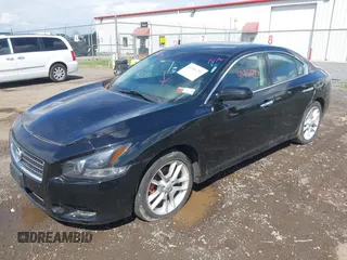 2014 Nissan Maxima SV with VIN 1N4AA5AP3EC487667, listed as a IAAI auction lot 42356793 with 164,601 mi miles and . Bid and sale history available at DreamBid. Image 2.