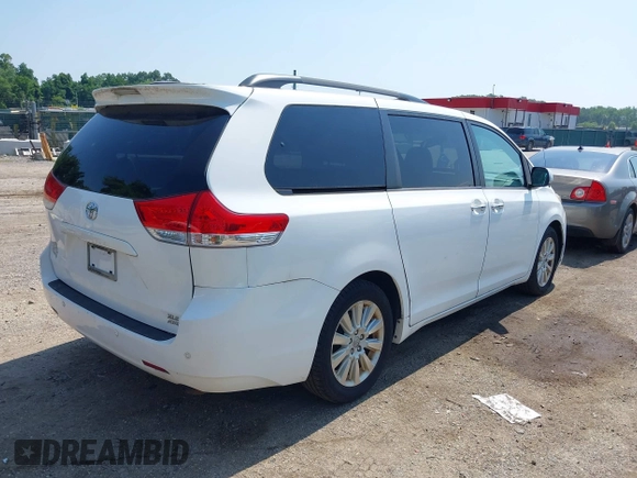 2014 Toyota Sienna Limited with VIN 5TDDK3DC3ES079590, listed as a IAAI auction lot 42694690 with 189,456 mi miles and . Bid and sale history available at DreamBid. Image 4.