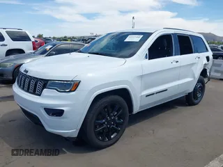 2021 Jeep Grand Cherokee Laredo E with VIN 1C4RJEAG2MC785168, listed as a IAAI auction lot 42115460 with 64,036 mi miles and . Bid and sale history available at DreamBid. Image 19.