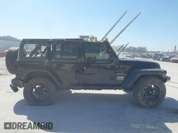 2019 Jeep Wrangler Unlimited Sahara with VIN 1C4HJXEG5KW518202, listed as a IAAI auction lot 41762229 with 91,995 mi miles and . Bid and sale history available at DreamBid. Image 14.