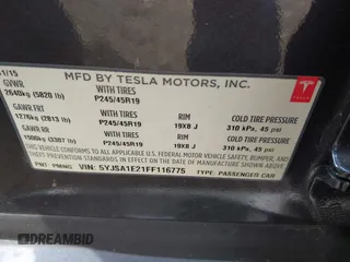 2015 Tesla Model S 85D with VIN 5YJSA1E21FF116775, listed as a IAAI auction lot 41876772 with 128,805 mi miles. Bid and sale history available at carsss.com. Image 9.