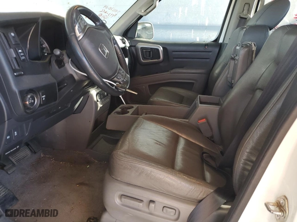 2014 Honda Ridgeline RTL with VIN 5FPYK1F51EB011627, listed as a Copart auction lot 88334645 with 137,494 mi miles and Salvage Title. Bid and sale history available at carsss.com. Image 7.