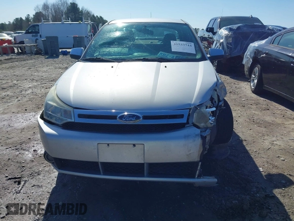2008 Ford Focus SE with VIN 1FAHP33N48W114038, listed as a IAAI auction lot 41533744 with 143,065 mi miles. Bid and sale history available at carsss.com. Image 11.