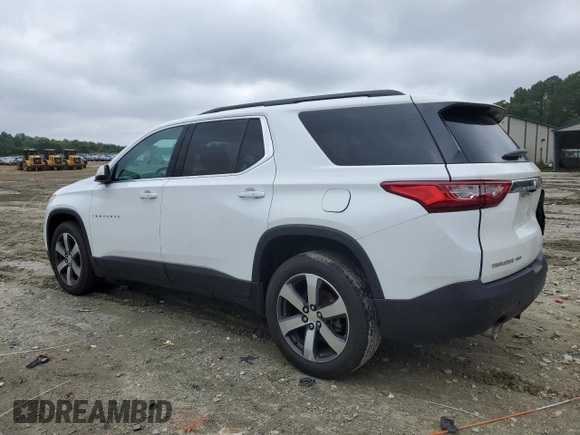 2021 Chevrolet Traverse LT with VIN 1GNEVHKWXMJ214024, listed as a Copart auction lot 56917015 with 68,829 mi miles and Salvage title. Bid and sale history available at DreamBid. Image 2.