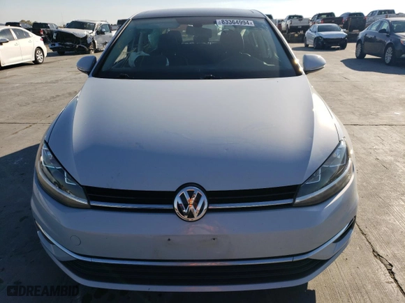 2021 Volkswagen Golf TSI with VIN 3VWG57AU7MM001169, listed as a Copart auction lot 83364994 with 74,216 mi miles and Salvage Title. Bid and sale history available at carsss.com. Image 5.