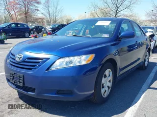 2007 Toyota Camry CE with VIN 4T1BE46K07U090307, listed as a IAAI auction lot 42000642 with 242,517 mi miles and . Bid and sale history available at DreamBid. Image 2.