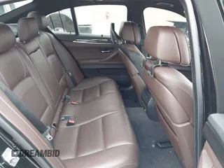 2014 BMW 5 Series 535d with VIN WBAXA5C59ED690375, listed as a IAAI auction lot 42030902 with 70,553 mi miles and . Bid and sale history available at carsss.com. Image 8.