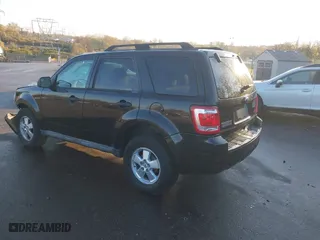 2011 Ford Escape XLT with VIN 1FMCU9DG4BKC30933, listed as a IAAI auction lot 40828476 with 146,808 mi miles. Bid and sale history available at carsss.com. Image 3.
