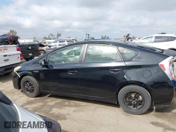 2012 Toyota Prius One with VIN JTDKN3DU8C5485214, listed as a IAAI auction lot 42136855 with 82,355 mi miles. Bid and sale history available at carsss.com. Image 14.