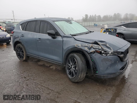 2024 Mazda CX-5 S Carbon Edition z VIN JM3KFBCM6R0367121, wystawiony jako Copart lot #51570125 z przebiegiem 49 762 mil mil oraz Szkody całkowita. Historia ofert i sprzedaży dostępna na DreamBid. Obrazek 4.