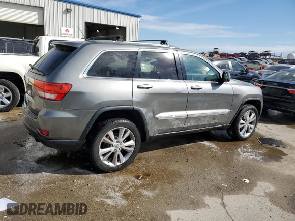 2012 Jeep Grand Cherokee Laredo with VIN 1C4RJEAG1CC306950, listed as a Copart auction lot 84912434 with 128,659 mi miles and Salvage Title. Bid and sale history available at carsss.com. Image 3.