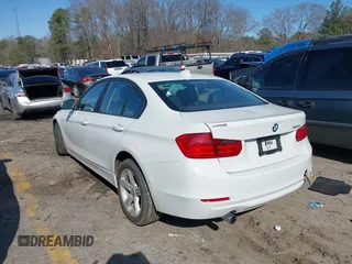 2014 BMW 3 Series 320i with VIN WBA3B1C50EK132169, listed as a IAAI auction lot 41570678 with 28,871 mi miles. Bid and sale history available at carsss.com. Image 3.