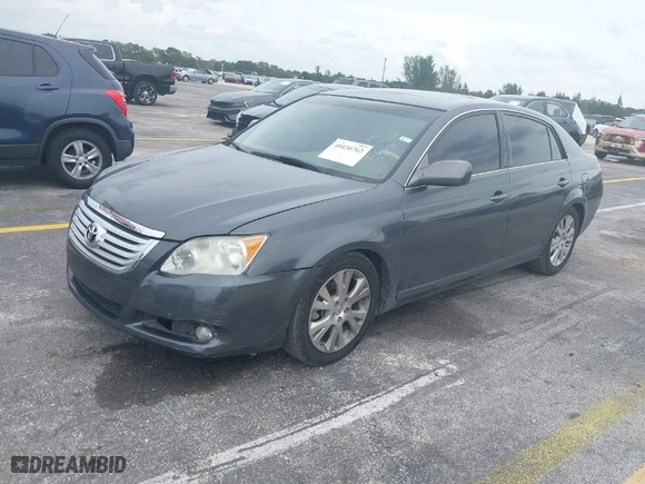 2009 Toyota Avalon XL with VIN 4T1BK36BX9U326676, listed as a IAAI auction lot 40436762 with 137,905 mi miles. Bid and sale history available at carsss.com. Image 2.
