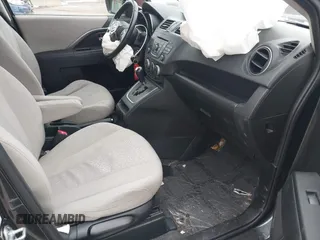 2012 Mazda 5 Touring with VIN JM1CW2CL6C0107233, listed as a IAAI auction lot 41332199 with 130,428 mi miles and . Bid and sale history available at DreamBid. Image 5.
