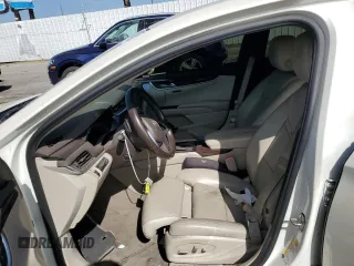 2014 Cadillac XTS Premium with VIN 2G61P5S36E9305491, listed as a Copart auction lot 44404425 with 104,710 mi miles and Salvage Title. Bid and sale history available at DreamBid. Image 7.
