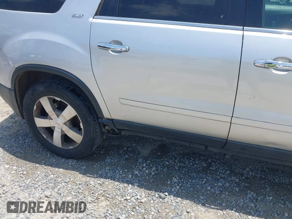 2010 GMC Acadia SLT1 z VIN 1GKLRMED7AJ176632, wystawiony jako IAAI lot #42305202 z przebiegiem 196 464 mil mil oraz . Historia ofert i sprzedaży dostępna na DreamBid. Obrazek 6.