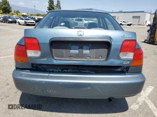 1998 Honda Civic DX with VIN JHMEJ6624WS000450, listed as a Copart auction lot 54217265 with 299,994 mi miles and Salvage Title. Bid and sale history available at carsss.com. Image 6.