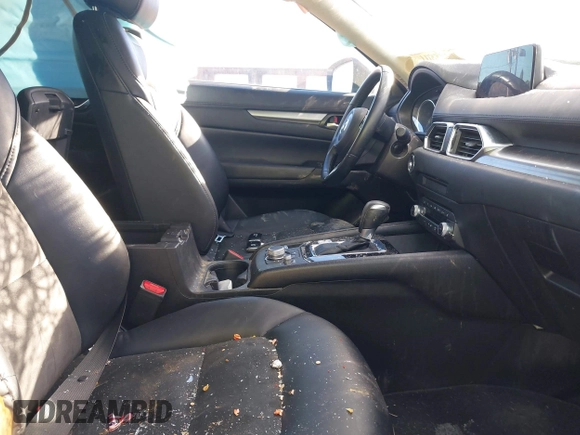 2020 Mazda CX-5 Touring with VIN JM3KFBCM0L0828207, listed as a IAAI auction lot 41305801 with 56,500 mi miles and . Bid and sale history available at DreamBid. Image 5.