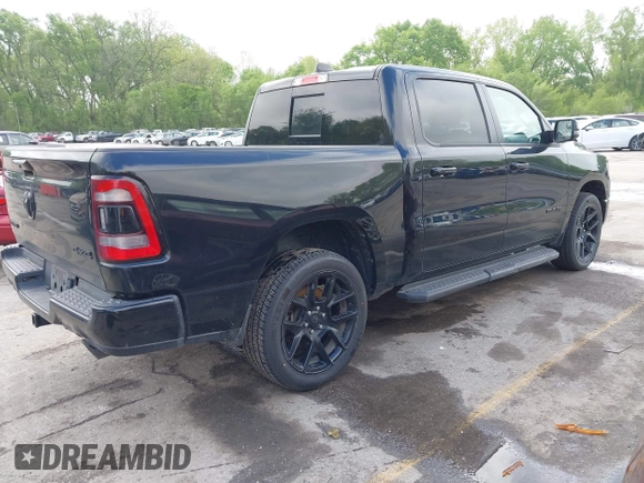 2023 Ram 1500 Laramie with VIN 1C6SRFJTXPN541328, listed as a IAAI auction lot 42121615 with 61,939 mi miles and . Bid and sale history available at DreamBid. Image 4.