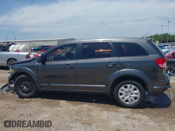 2015 Dodge Journey American Value z VIN 3C4PDCAB2FT637391, wystawiony jako IAAI lot #42354094 z przebiegiem 130 743 mil mil oraz . Historia ofert i sprzedaży dostępna na DreamBid. Obrazek 14.