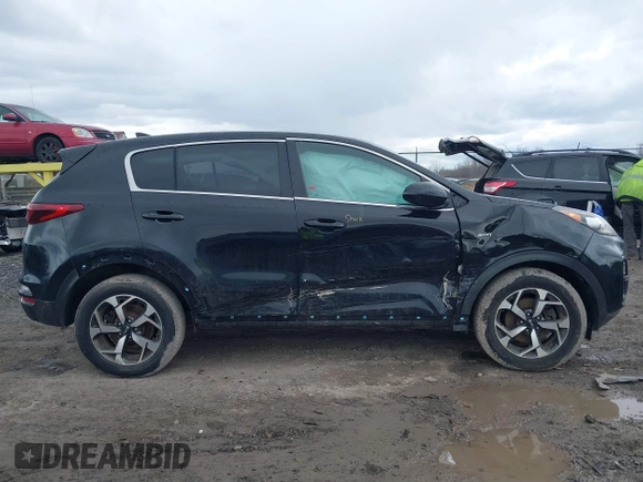 2020 Kia Sportage LX with VIN KNDPMCAC1L7662825, listed as a IAAI auction lot 42031280 with 123,595 mi miles and . Bid and sale history available at carsss.com. Image 6.
