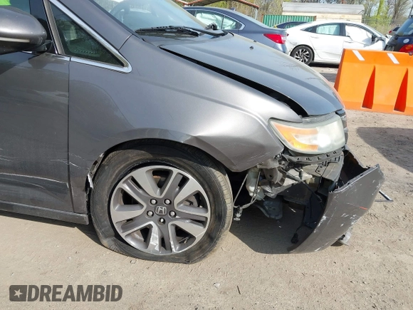 2014 Honda Odyssey Touring with VIN 5FNRL5H92EB073085, listed as a IAAI auction lot 42065913 with 120,834 mi miles and . Bid and sale history available at DreamBid. Image 6.