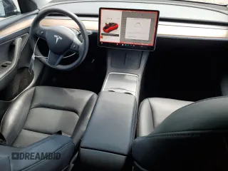 2025 Tesla Model Y Long Range with VIN 7SAYGDED8SF241779, listed as a Copart auction lot 51899205 with 12,409 mi miles and Salvage Title. Bid and sale history available at DreamBid. Image 8.