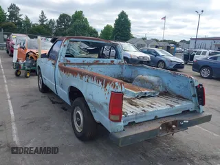 1991 Chevrolet Colorado 1LT z VIN 1GCCS14E7M8105645, wystawiony jako IAAI lot #42379685 z przebiegiem 106 778 mil mil oraz . Historia ofert i sprzedaży dostępna na DreamBid. Obrazek 3.