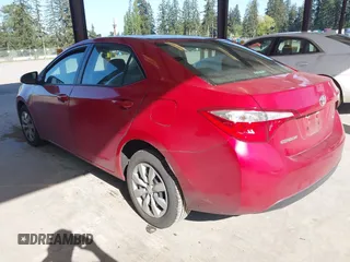 2015 Toyota Corolla L with VIN 5YFBURHE6FP332900, listed as a IAAI auction lot 42164721 with 158,758 mi miles and . Bid and sale history available at DreamBid. Image 3.