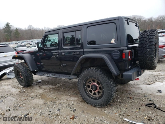 2018 Jeep Wrangler Unlimited Rubicon with VIN 1C4HJXFG1JW106940, listed as a Copart auction lot 82303054 with 83,492 mi miles and Salvage Title. Bid and sale history available at carsss.com. Image 2.