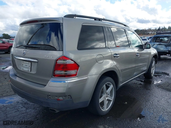 2007 Mercedes-Benz GL-Class with VIN 4JGBF71E17A132064, listed as a IAAI auction lot 41712672 with 129,744 mi miles. Bid and sale history available at carsss.com. Image 4.