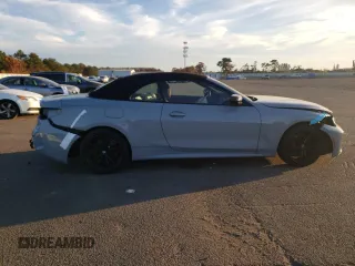 2023 BMW 4 Series 430i xDrive with VIN WBA43AT0XPCL59517, listed as a Copart auction lot 72859063 with 8,653 mi miles and Salvage Title. Bid and sale history available at DreamBid. Image 4.
