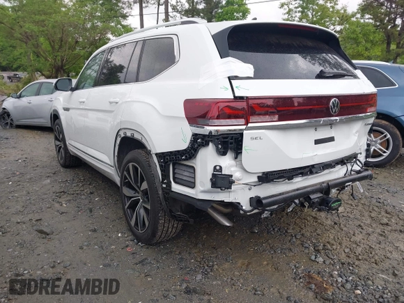 2024 Volkswagen Atlas SEL Premium R-Line with VIN 1V2FR2CA0RC598455, listed as a IAAI auction lot 42060180 with 2,865 mi miles and . Bid and sale history available at DreamBid. Image 3.