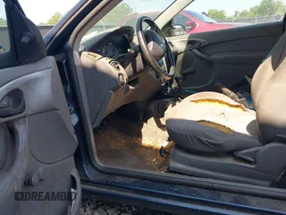 2003 Ford Focus ZX3 с VIN 3FAFP31303R111982, выставлен на аукционе IAAI как лот 42569659 с пробегом 231 346 миль миль и . История ставок и продаж доступна на DreamBid. Изображение 5.