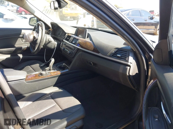 2015 BMW 3 Series 328i with VIN WBA3C1C51FK123852, listed as a IAAI auction lot 41857179 with 90,308 mi miles and . Bid and sale history available at carsss.com. Image 5.
