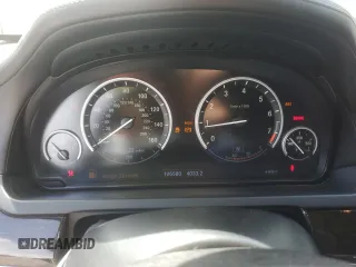 2013 BMW 7 Series 750i with VIN WBAYA8C58DC996431, listed as a Copart auction lot 70366064 with 106,580 mi miles and Salvage Title. Bid and sale history available at DreamBid. Image 9.