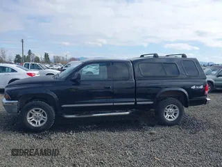 2004 Dodge Dakota SLT with VIN 1D7HG42N94S618531, listed as a IAAI auction lot 41741467 with 202,422 mi miles. Bid and sale history available at carsss.com. Image 14.