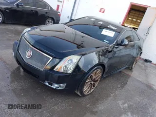 2011 Cadillac CTS Performance z VIN 1G6DJ1ED7B0135191, wystawiony jako IAAI lot #41660128 z przebiegiem 121 567 mil mil oraz . Historia ofert i sprzedaży dostępna na DreamBid. Obrazek 2.