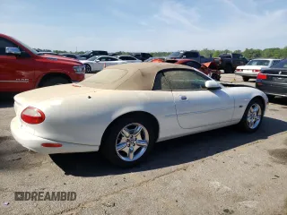 1999 Jaguar XK with VIN SAJGX2043XC040866, listed as a Copart auction lot 53712555 with 65,349 mi miles and Clean Title. Bid and sale history available at DreamBid. Image 3.