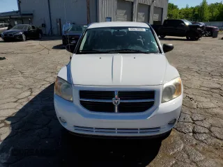 2011 Dodge Caliber Mainstreet with VIN 1B3CB3HA2BD231632, listed as a Copart auction lot 55273855 with 70,818 mi miles and Salvage Title. Bid and sale history available at DreamBid. Image 5.