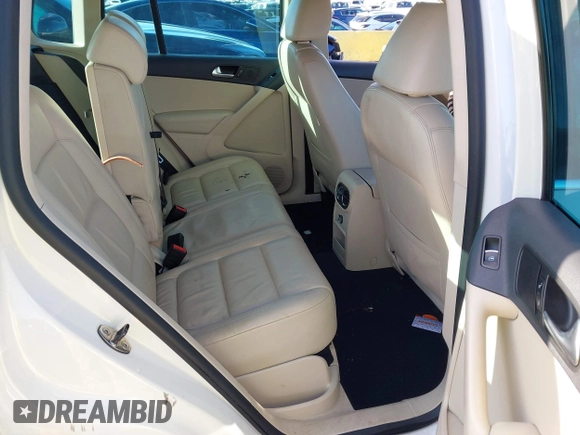 2011 Volkswagen Tiguan SE with VIN WVGBV7AX8BW536365, listed as a IAAI auction lot 41854029 with 126,916 mi miles and . Bid and sale history available at DreamBid. Image 8.
