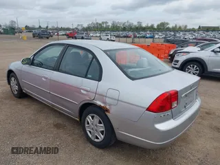2003 Honda Civic LX with VIN 2HGES16533H571332, listed as a IAAI auction lot 42153221 with 202,926 mi miles. Bid and sale history available at carsss.com. Image 3.