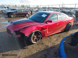 2011 Dodge Charger Road/Track with VIN 2B3CL5CT6BH571984, listed as a IAAI auction lot 41810361 with 188,780 mi miles. Bid and sale history available at carsss.com. Image 2.