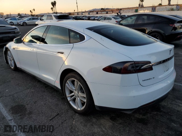 2015 Tesla Model S 85D with VIN 5YJSA1S21FF087461, listed as a Copart auction lot 87027334 with 53,868 mi miles and Salvage Title. Bid and sale history available at carsss.com. Image 2.