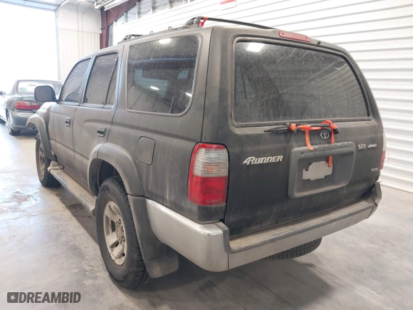 2000 Toyota 4Runner SR5 with VIN JT3HN86R0Y0276977, listed as a IAAI auction lot 41884243 with 375,779 mi miles. Bid and sale history available at carsss.com. Image 3.