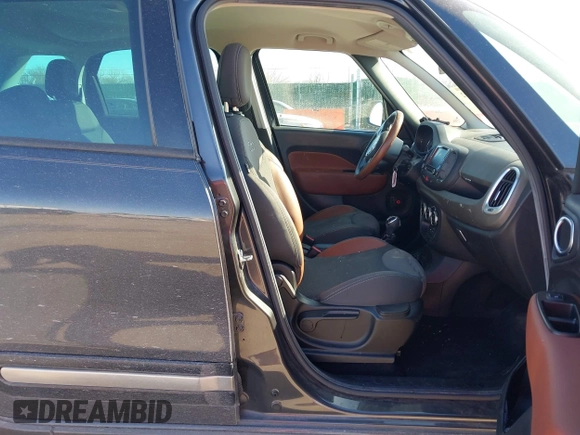 2014 FIAT 500L Trekking with VIN ZFBCFADH4EZ017858, listed as a IAAI auction lot 41313202 with 190,725 mi miles and . Bid and sale history available at DreamBid. Image 5.