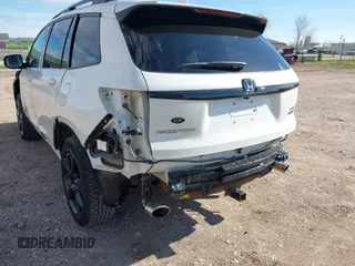 2019 Honda Passport Elite z VIN 5FNYF8H0XKB001472, wystawiony jako IAAI lot #42143890 z przebiegiem 98 119 mil mil oraz . Historia ofert i sprzedaży dostępna na DreamBid. Obrazek 18.