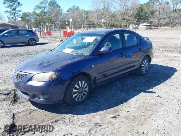 2006 Mazda 3 i Touring with VIN JM1BK32F561494865, listed as a IAAI auction lot 41637307 with 157,317 mi miles and . Bid and sale history available at DreamBid. Image 2.