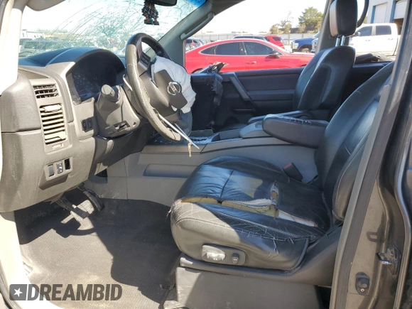 2004 Nissan Titan LE with VIN 1N6AA07B24N575053, listed as a Copart auction lot 50370985 with 230,225 mi miles and Salvage title. Bid and sale history available at DreamBid. Image 7.